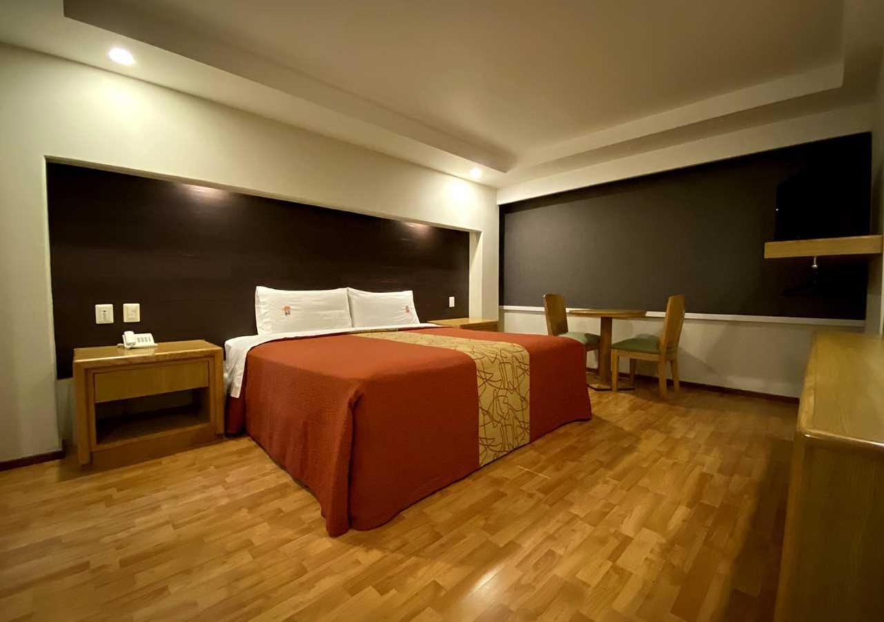 Quarto com Cama Queen-size
