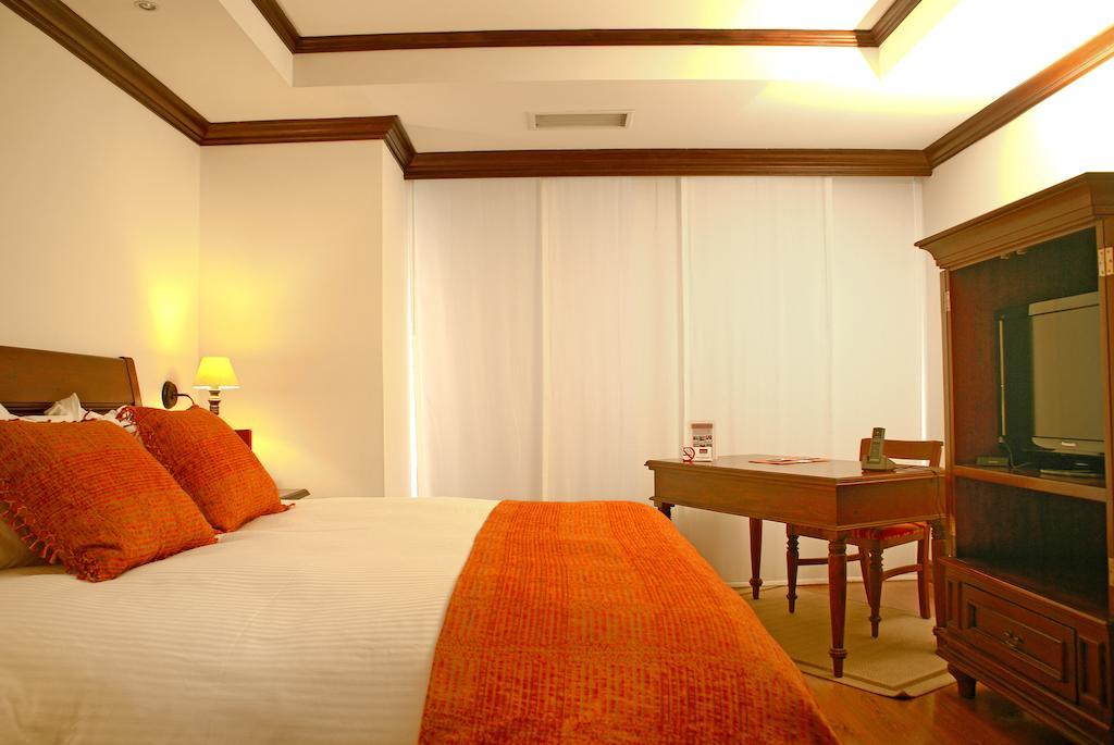 Suite Principal con 1 cama extragrande y sofá cama