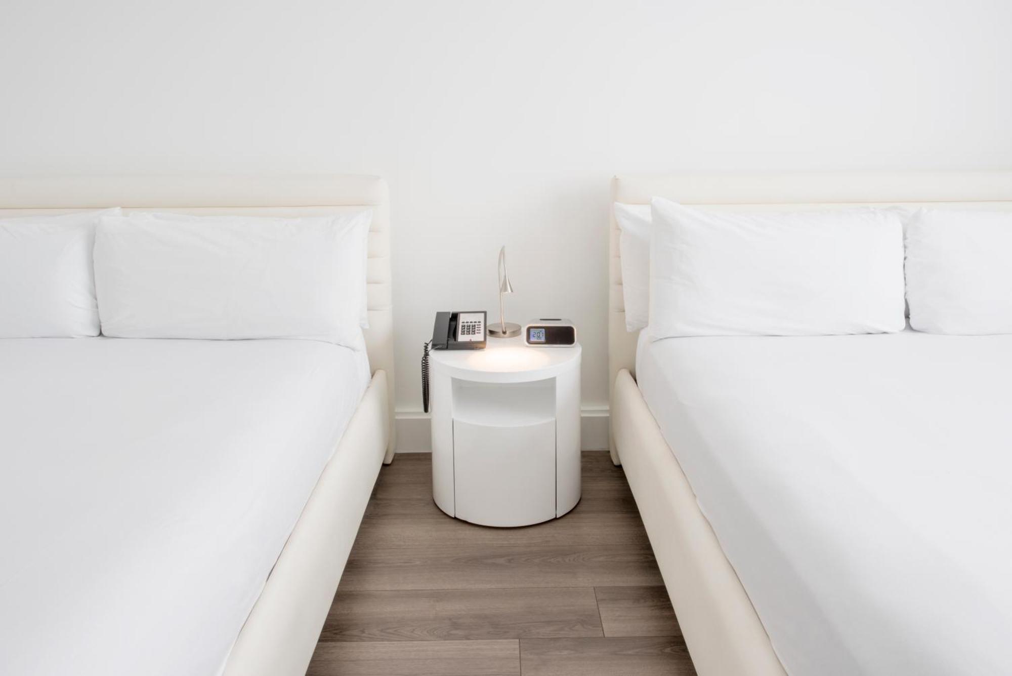 Traditionelles Zimmer mit 2 Queensize-Betten