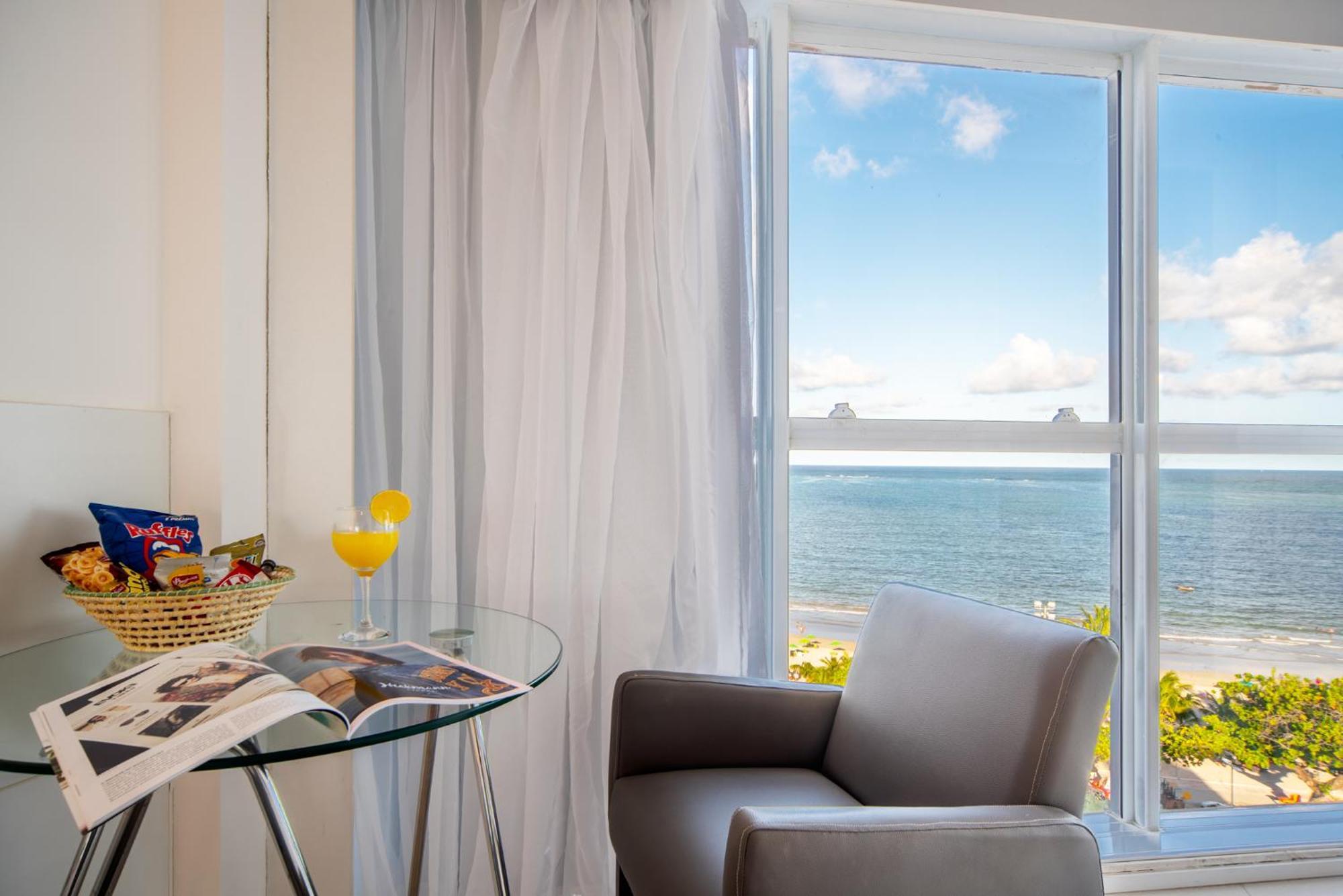 Quarto com cama casal Frente mar,1007181145:JPEG