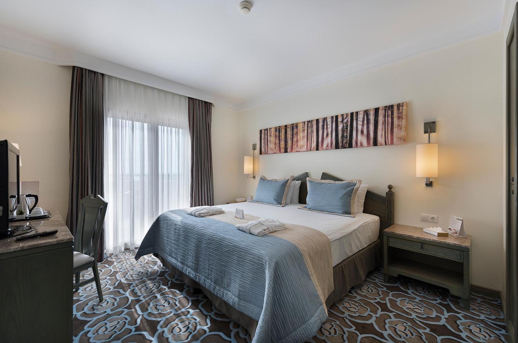 Main Building Junior Suite with Sea View (2 Adults + 2 Children)