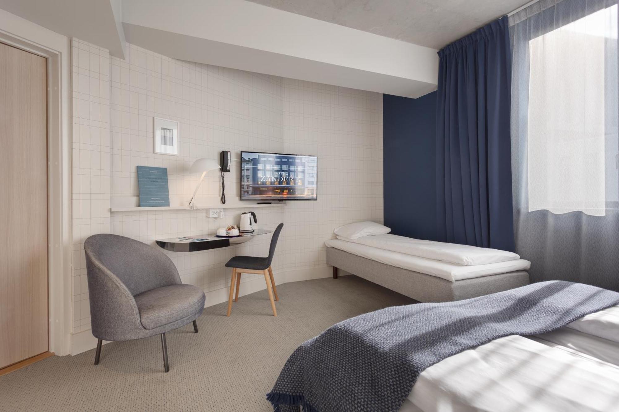 Familiekamer met 2 aparte bedden.