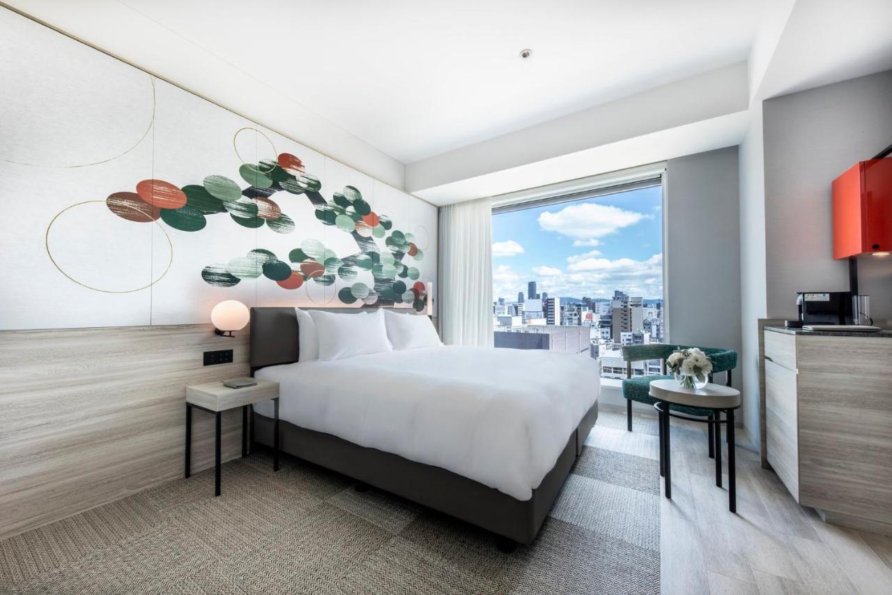 Habitación Deluxe - Cama extragrande - Planta Club