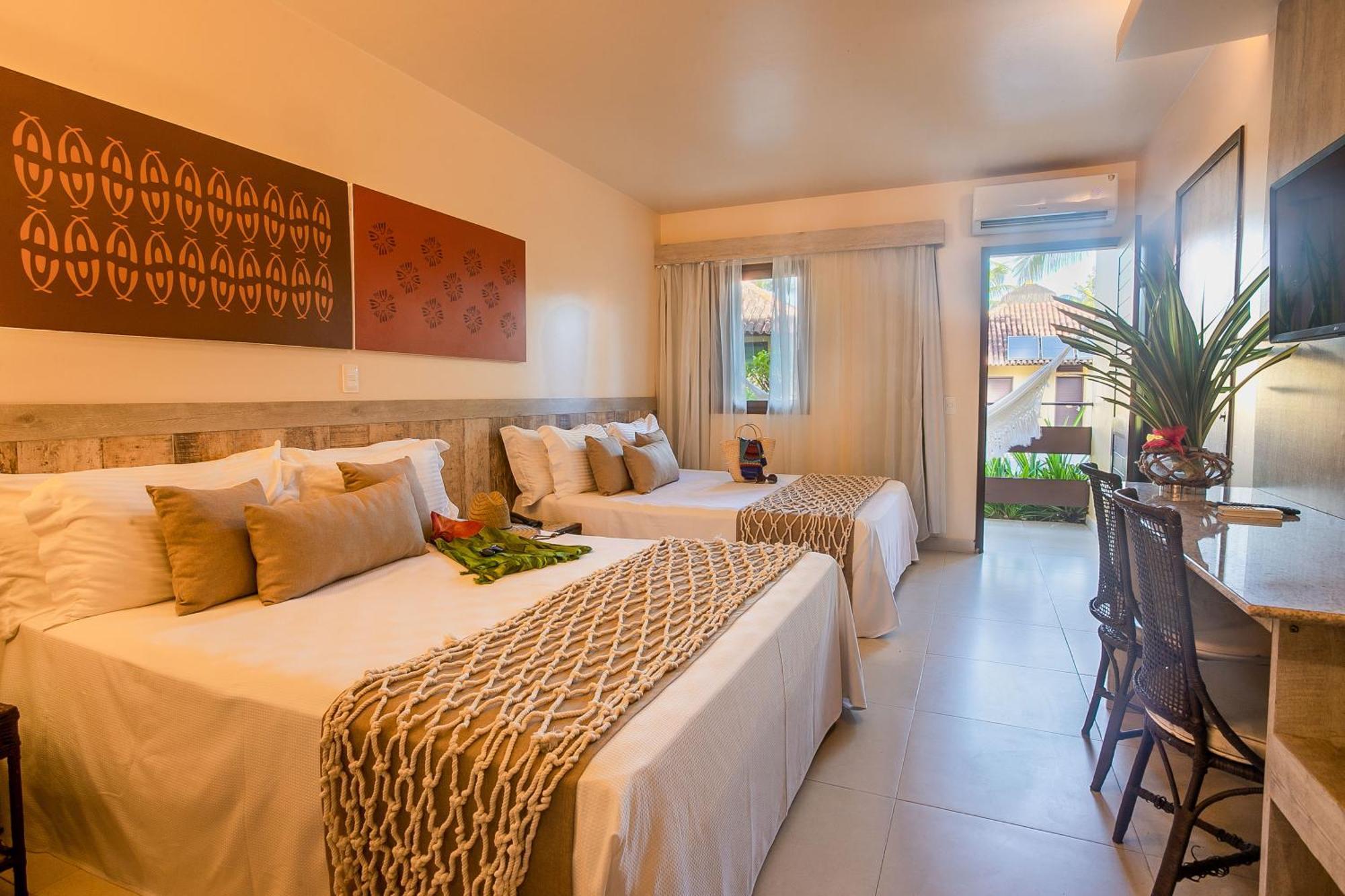 Habitación Triple con vistas al jardín