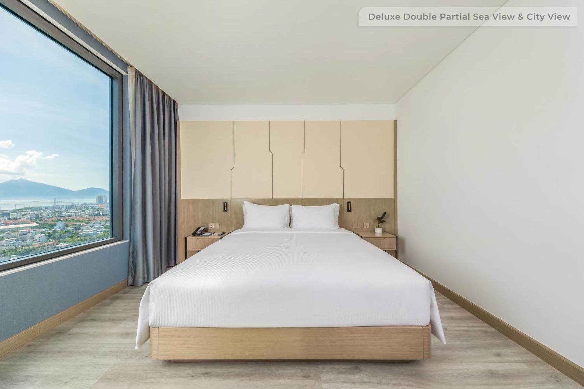Quarto Duplo Deluxe com Vista Parcial do Mar