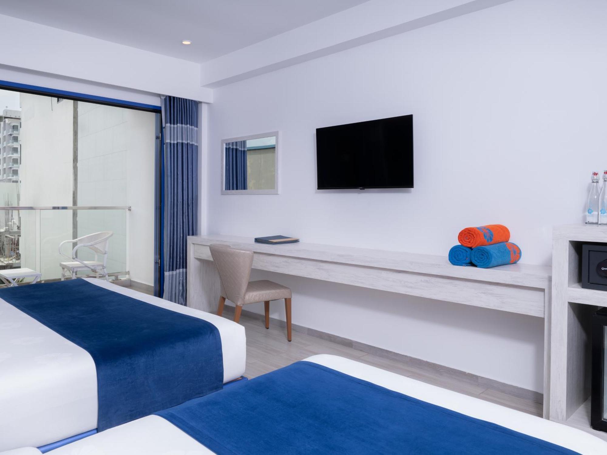 Deluxe Familiekamer met Balkon en Uitzicht op de Stad