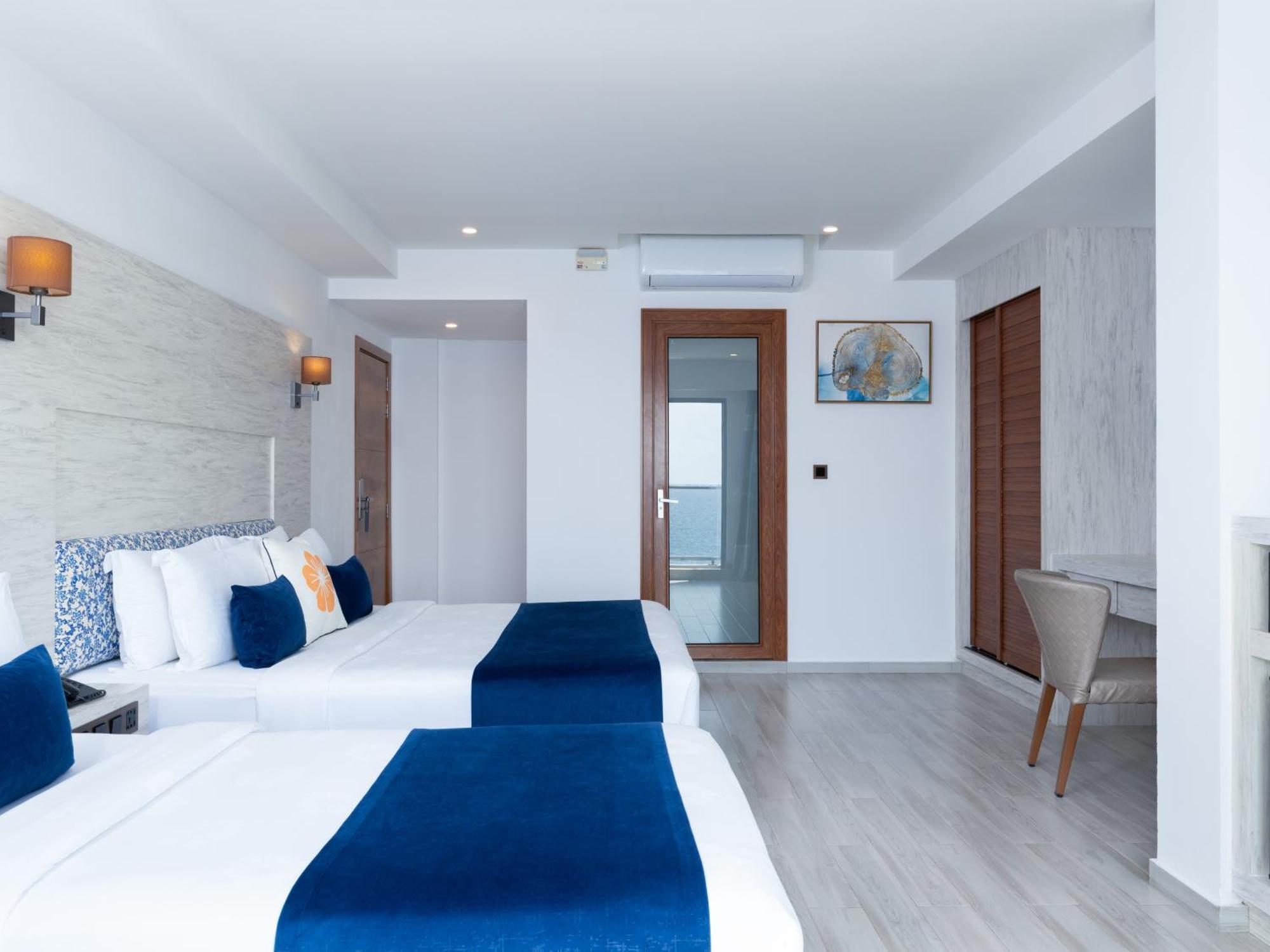 Deluxe Familiekamer met Balkon en Uitzicht op Zee