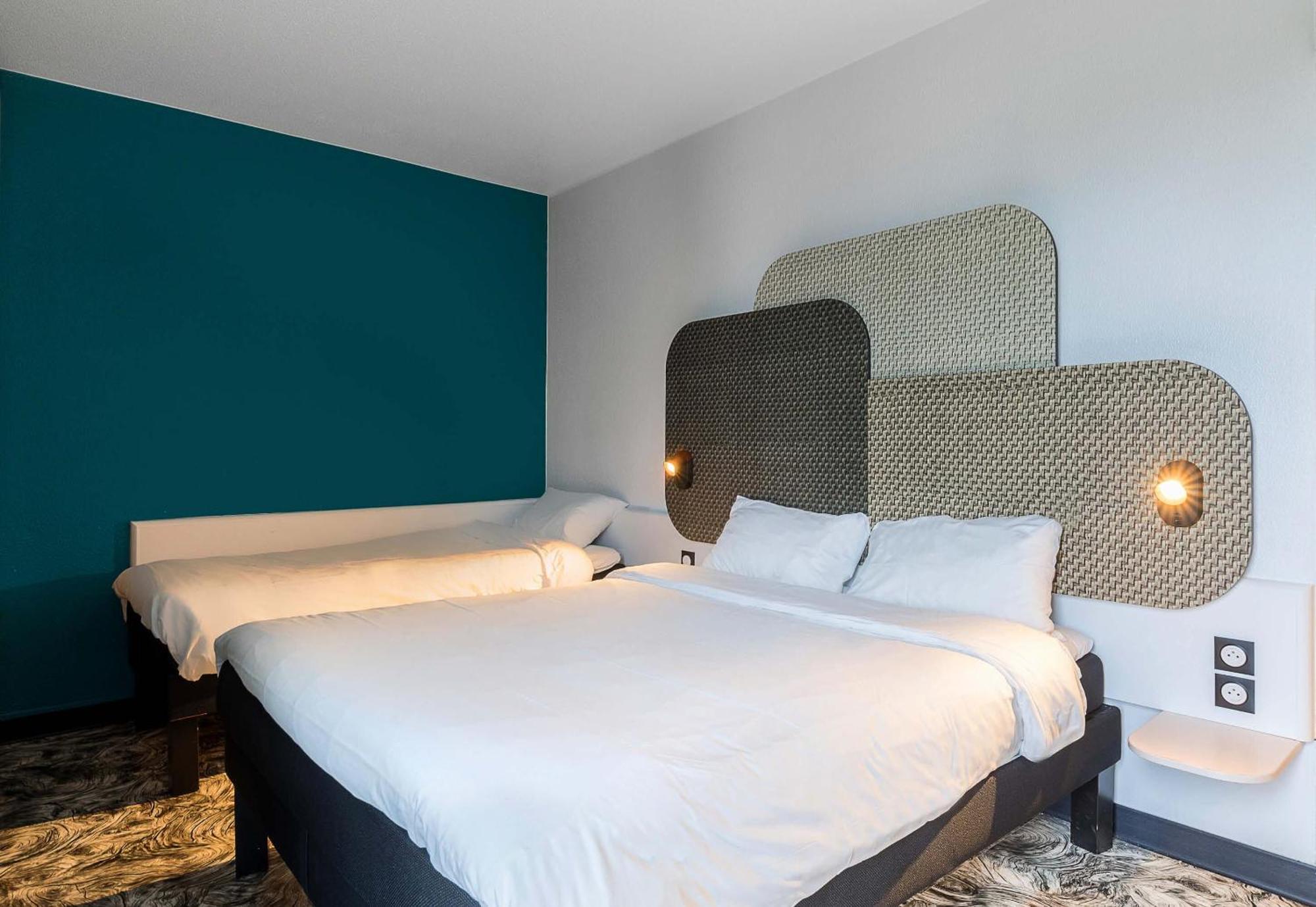 Standaard Kamer met 1 Tweepersoonsbed en 1 Eenpersoonsbed