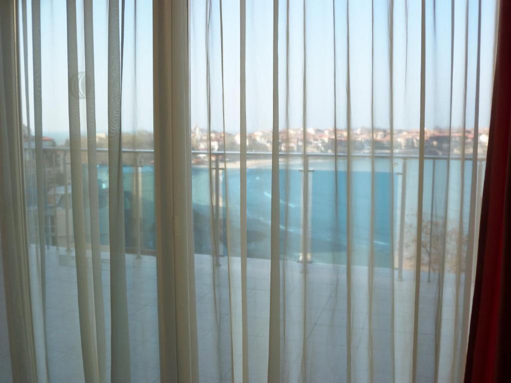 Quarto com 2 Camas de Solteiro, 1 Cama Extra e Vista do Mar (2 Adultos + 1 Criança)