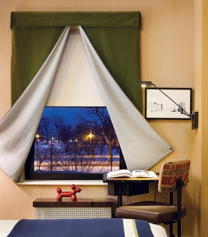 Doppelzimmer mit 2 Doppelbetten und Seeblick