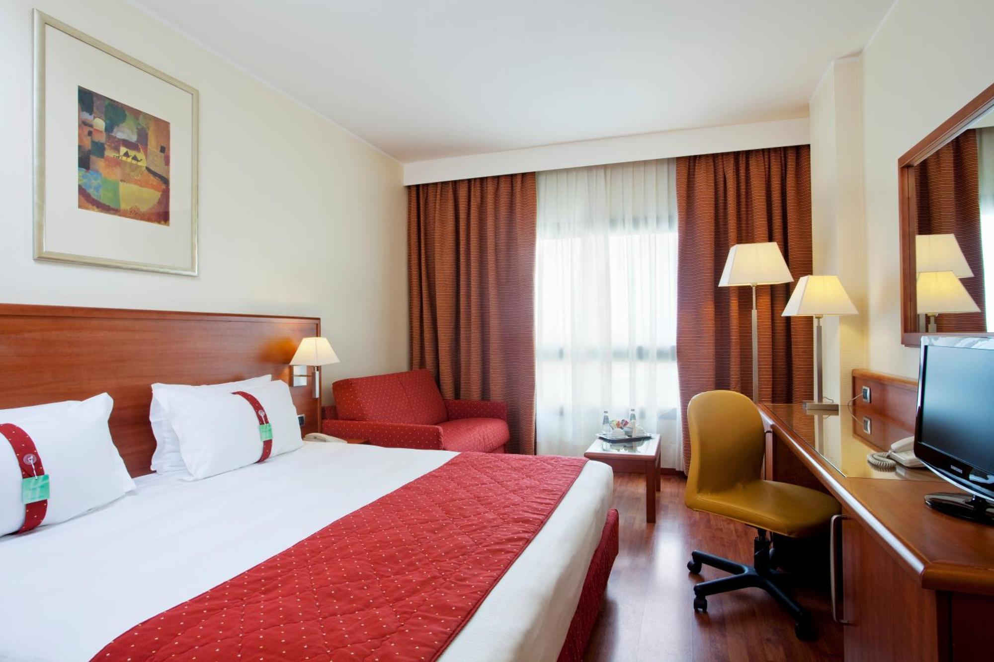 Habitación Premium con cama extragrande y sofá cama