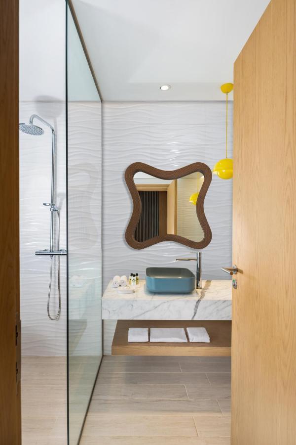 Chambre Premium avec Balcon - Vue sur la plage de palmiers